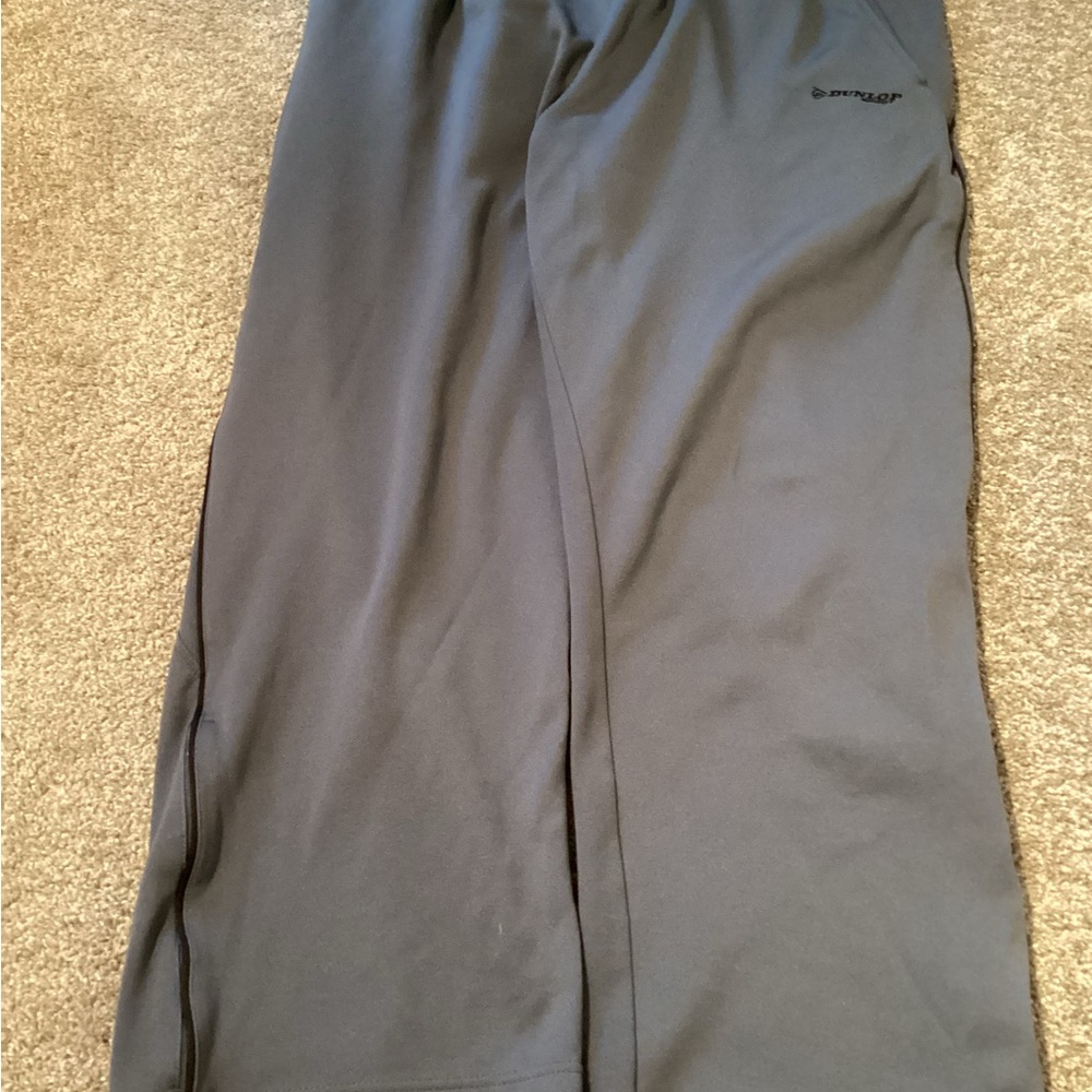Gray Dunlop sweatpants.